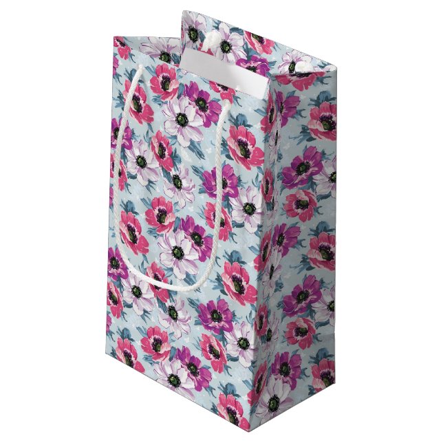 Elegance colour flowers pattern on blue small gift bag (Back Angled)