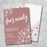 Elegant 90th Birthday Party Invitation<br><div class="desc">Elegant Ninety 90th Birthday Party Invitation. A fun but elegant 50th birthday party invitation with mauve pink and white flowers for the young at heart. Please note that the gold will not have any actual shine to it, it's simply a colour. A playful flower pattern frames a script typography "she's...</div>