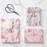 Elegant Abstract in White Christmas Wrapping Paper Sheet<br><div class="desc">This beautiful wrapping paper set features an abstract design for the holidays,  in three different colorways,  featuring shades of pink,  red,  pale green and white.</div>