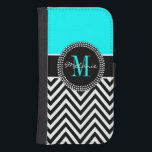 Elegant Aqua and Black Chevron Monogrammed Samsung S4 Wallet Case<br><div class="desc">Aqua Blue and Black Chevron Pattern with Elegant Monogram Names and Initial Design by Elke Clarke©. Other styles and colours available in our shop at www.zazzle.com/monogramgallery. Trendy gift for any girly girl who wants the latest fashion styles in bold,  modern,  stripes.</div>