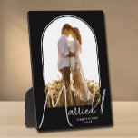Elegant Arch Wedding Photo Black Plaque<br><div class="desc">A special keepsake features your wedding photo in an elegant arch design with the text "Married" in chic text along with your names and wedding date. Beautiful gift for your family and a fabulous memory to display in your own home. BACKGROUND colour can be changed! MORE COLORS in our collection....</div>