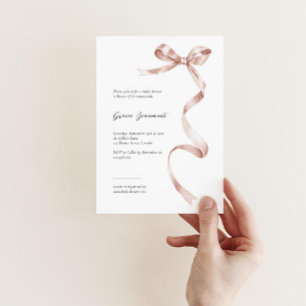 Elegant baby shower invitation with pink ribbon