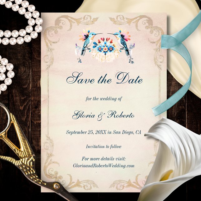 Elegant Baroque Hummingbird Old Mexico Wedding Save The Date (Soft blush background with golden Baroque scrolls and two vibrant hummingbirds framing florals.)