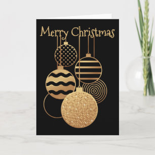 Elegant black and gold baubles and Merry Christmas Card