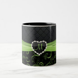Elegant Black and Peridot Green Floral Monogram Two-Tone Coffee Mug
