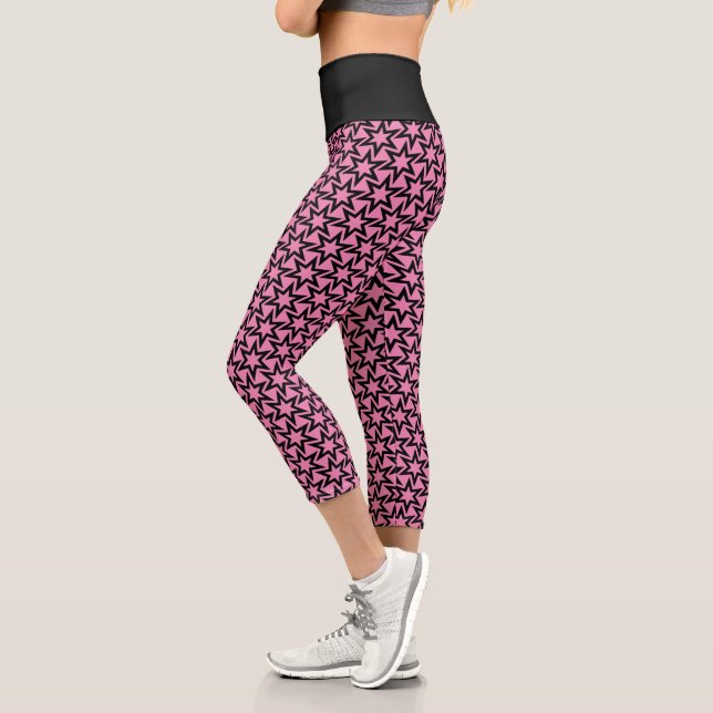 Elegant Black and Pink Geometric Star Pattern Capri Leggings (Left)