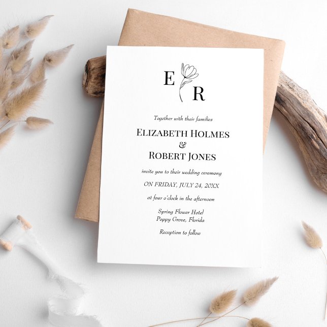 Elegant Black and White Floral Monogram Wedding  Invitation (Elegant Black and White Floral Monogram Wedding Invitation on white table with neutral boho decor.)