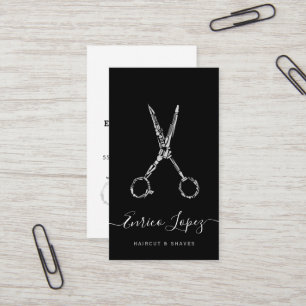 Elegant black and white haircut and shaves barber business card