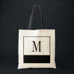 Elegant Black and White Monogram Bag<br><div class="desc">If you're looking for a bridesmaid bag or a unique personalised bridesmaids gift idea, these elegant little black and white bags are the answer! The bag is available in all different sizes, and come in a white background with a large black colour block on the bottom. Each bag can be...</div>