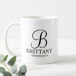 Elegant Black and White Personalised Bridesmaid Coffee Mug<br><div class="desc">Elegant Black and White Personalised Bridesmaid Gifts
featuring personalised monogram in elegant calligraphy font style with bridesmaid's name and title in classic serif font style.

Also perfect for Maid of Honour,  Flower Girl,  Mother of the Bride and more.</div>