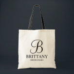 Elegant Black and White Personalised Bridesmaid Tote Bag<br><div class="desc">Elegant Black and White Personalised Bridesmaid Gifts
featuring personalised monogram in elegant calligraphy font style with bridesmaid's name and title in classic serif font style.

Also perfect for Maid of Honour,  Flower Girl,  Mother of the Bride and more.</div>