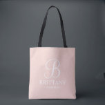 Elegant Black and White Personalised Bridesmaid Tote Bag<br><div class="desc">Elegant Black and White Personalised Bridesmaid Gifts
featuring personalised monogram in white elegant script font style with bridesmaid's name and title in classic serif font style on blush pink background.

Also perfect for Maid of Honour,  Flower Girl,  Mother of the Bride and more.</div>