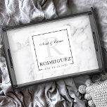 Elegant Black And White Wedding Monogram Serving Tray<br><div class="desc">Elevate their home with our Elegant Black And White Wedding Monogram Serving Tray. Ideal for anniversaries, bridal showers, weddings, and engagement parties, this sophisticated tray makes for a thoughtful and elegant gift. Personalise it with the couple's monogram or new last name, creating a custom touch for their home. This stylish...</div>