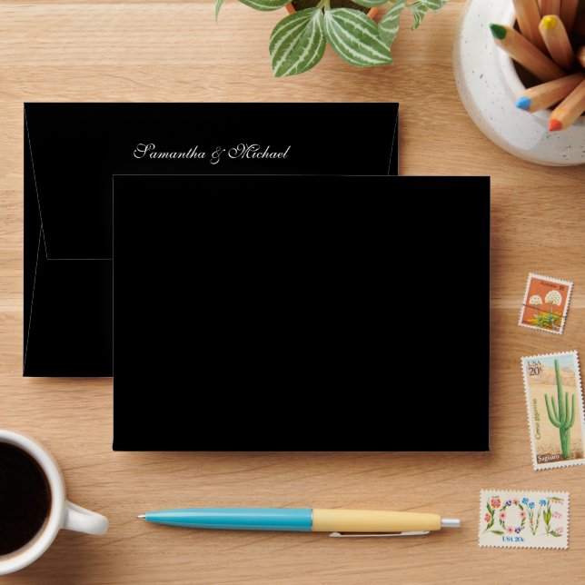 Elegant Black Envelope with White Script Address (Desk)