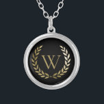 Elegant Black Gold Laurel Wreath Monogram Silver Plated Necklace<br><div class="desc">This elegant personalised necklace features a faux gold monogram framed with a gold laurel wreath on a simple black background. Designed by Susan Coffey.</div>