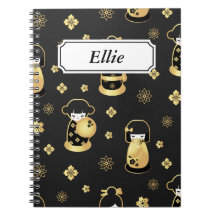 Elegant black golden Japanese dolls