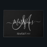 Elegant Black Grey Monogram Script Family Name Doormat<br><div class="desc">Personalised black and white and grey monogram design with bride and groom last name and wedding date on a black background. Makes a unique and great gift for newlyweds starting a new family. Great for new house together. Customise with your name, monogram initial and wedding date and colours. Elke Clarke©...</div>