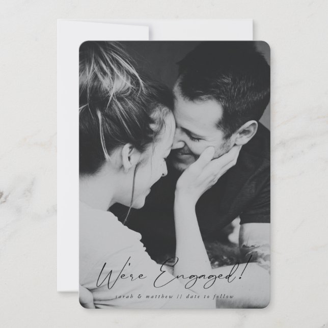 Elegant Black Hand Written Script Engagement Photo Announcement (Front)
