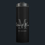 Elegant Black Monogram Newlywed Wedding Thermal Tumbler<br><div class="desc">Stay hydrated on your honeymoon with this Elegant Black Monogram Newlywed Wedding Thermal Tumbler. This is a modern customisable design is in black, white and grey. Bride and groom's first names are on the centre in modern white handwriting script lettering and initial of new last name is in grey. Established...</div>