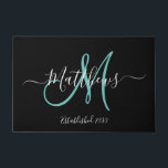 Elegant Black Teal Monogram Script Family Name Doormat<br><div class="desc">Personalised black and white and teal monogram design with bride and groom last name and wedding date on a black background. Makes a unique and great gift for newlyweds starting a new family. Great for new house together. Customise with your name, monogram initial and wedding date and colours. Elke Clarke©...</div>