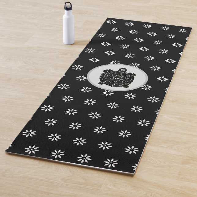 Elegant Black Turtle with White Flowers on Black Yoga Mat (In Situ)