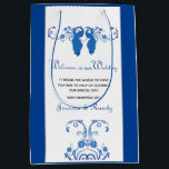 Elegant Blue Peacock Wedding Welcome Gift Bag<br><div class="desc">A beautiful medium sized gift bag from our Elegant Blue Peacock Wedding Suite! Greet your wedding guests with a welcome packet all wrapped up in this 12.5"L x 4"W x 9"H glossy gift bag that can be personalised with your own messaging (or utilise ours) and your names. Just update them...</div>