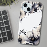 Elegant Boho Black White Floral Monogram iPhone 15 Case<br><div class="desc">Cute and simple modern black and white flower design. A classic but whimsical look with black, grey and cream coloured flowers with black font and chic modern lettering, contrasting with a bit of a rustic boho vibe. Edit all of the text to your own information. You can even change out...</div>
