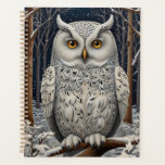 Elegant boho white owl woodland winter forest planner<br><div class="desc">Immerse yourself in the enchanting allure of this elegant bohemian owl artwork, where nature's elegance meets timeless artistry. Set against a lush winter forest backdrop, this exquisite piece captures the serene beauty of a pristine woodland landscape, rich with intricate details of the snow covered trees against midnight blue starry sky,...</div>