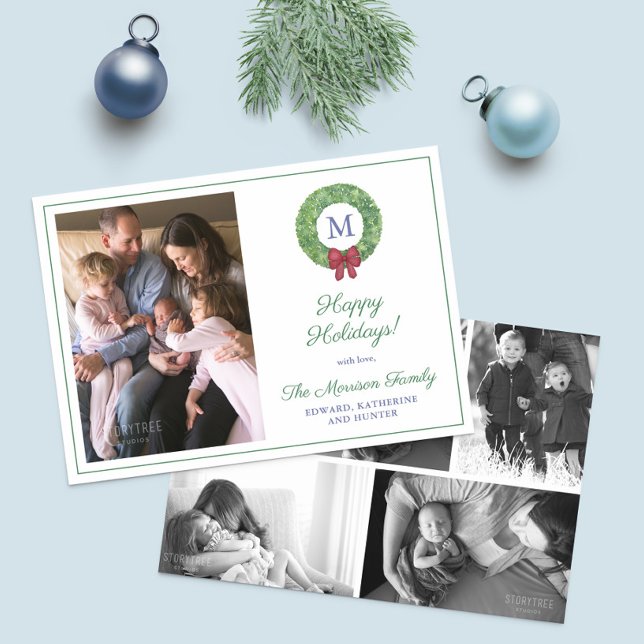 Elegant Boxwood Wreath Christmas Photo Collage Holiday Card (Festive wreath with red bow Merry Christmas holiday cards, featuring monogram & family photo collage)