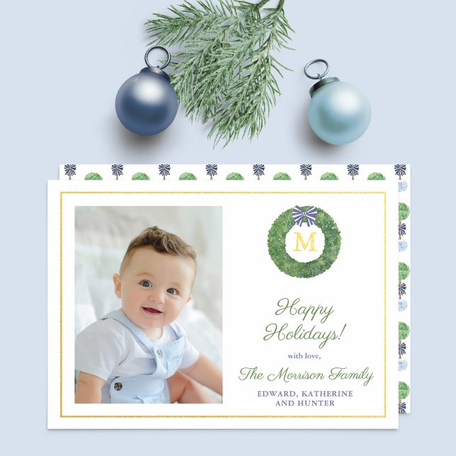Elegant Boxwood Wreath Monogram Photo Blue Gold Foil Holiday Card (Simple boxwood wreath Happy Holidays card with blue and white bow and gold foil details)