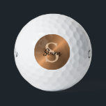 Elegant Bronze Metallic Monogram Name Mens Golf Balls<br><div class="desc">Play your golfing game in style with these Elegant Bronze Metallic Monogram Name Mens Golf Balls. CLICK PERSONALIZE TEMPLATE OPTION AND ENTER NAME AND MONOGRAM INITIAL. Designed with masculine faux metallic bronze background and light tan brown monogram on the centre. Personalised with name in black calligraphy script lettering. Makes a...</div>