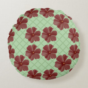 Elegant burgundy flowers on sage green round cushion