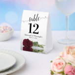 Elegant Burgundy Rose Wedding Table Number<br><div class="desc">These tent signs will not only help your guests find their tables, they'll also make your wedding reception more beautiful. The design is both elegant and romantic featuring a single burgundy, maroon, or wine red coloured rose lying on its side reflecting in water with waves and ripples. The title is...</div>