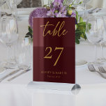 Elegant Burgundy with Gold Personalised Wedding Table Number<br><div class="desc">Transform your wedding reception with our Elegant Burgundy with Gold Personalised Wedding Table Numbers. Each table number features a rich burgundy background adorned with shimmering gold script, customised with your names and wedding date. These exquisite details not only guide guests to their tables but also elevate your decor with a...</div>