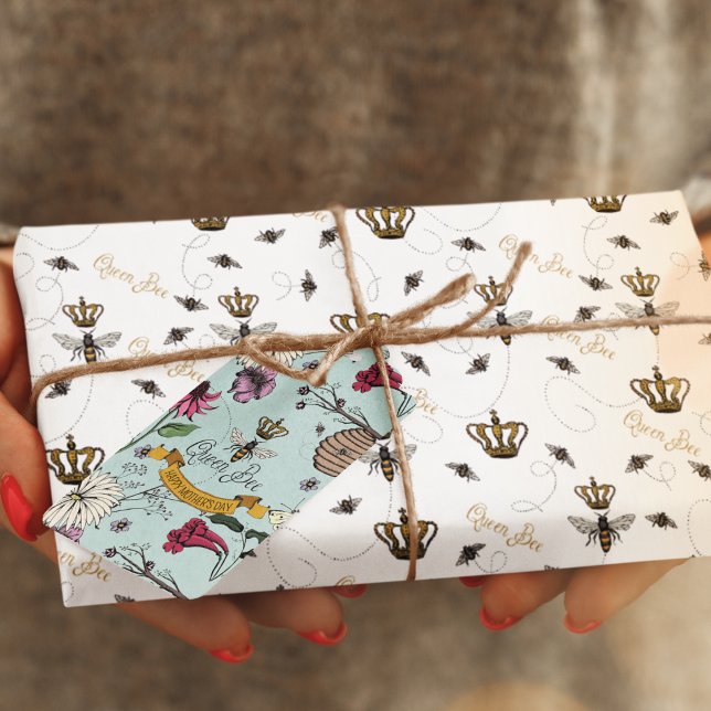 Elegant Buzzing Royal Queen Bee & Gold Crown Wrapping Paper (Elegant White Buzzing Queen Bees and Royal Crowns with the Gold Hand-Written Text, "Queen Bee". 
)