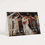 Elegant Calligraphy Custom Wedding Photo Thank You Card<br><div class="desc">Folded horizontal wedding thank you cards feature an elegant and stylish white calligraphy script text overlay design. Personalise the front with a favourite photo of the bride and groom, as well as a simple sans serif monogram of the couple's names. The back includes a second photo and a custom thank...</div>