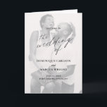 Elegant Calligraphy Photo Modern Wedding Programme<br><div class="desc">Simple Photo Wedding Program with "the wedding of" in calligraphy along with your wedding details over your favourite picture. The inside has your order of ceremony and wedding party and the back has your personalised thank you message in black and white. A minimalist design with chic typography for an elegant...</div>