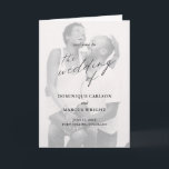 Elegant Calligraphy Photo Modern Wedding Programme<br><div class="desc">Simple Photo Wedding Program with "the wedding of" in calligraphy along with your wedding details over your favourite picture. The inside has your order of ceremony and wedding party and the back has your personalised thank you message in black and white. A minimalist design with chic typography for an elegant...</div>