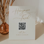 Elegant Charm Ivory QR Code Honeymoon Fund Sign<br><div class="desc">This elegant charm ivory QR code honeymoon fund sign is perfect for a simple wedding or bridal shower. The modern minimalist design features timeless vintage cream and gold romantic calligraphy with bohemian fairytale style.

Personalise your honeymoon registry QR code sign with your names.</div>