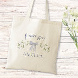 Elegant Chic Bow Floral Personalised Flower Girl  Tote Bag<br><div class="desc">Make your flower girl feel extra special with this chic personalised tote bag! Featuring a beautiful floral design and elegant bow, this tote is perfect for carrying wedding day essentials and makes a memorable gift. Customise with her name to add a personal touch that she'll cherish forever. Ideal for brides,...</div>
