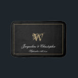 Elegant Chic Monogram Names Newlywed Wedding Bath Mat<br><div class="desc">Elegant Chic Monogram Names Newlywed Wedding Bath Mat. Cute stylish personalised black and gold monogrammed bath mat. Classic script for the monogrammed last name initial, the names of the bride and groom and the date on a chic black background. A perfect gift for newly weds, engaged couples or beautiful for...</div>