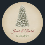 Elegant Christmas Tree Kraft Paper Wedding Classic Round Sticker<br><div class="desc">This elegant design features a snowy Christmas tree with lights. Click the customise button for more flexibility in modifying the text and the graphics! Variations of this design as well as coordinating products are available in our shop, zazzle.com/store/doodlelulu. Contact us if you need this design applied to a specific product...</div>