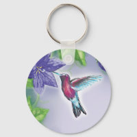 elegant colourful hummingbird and purple flowers