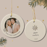 Elegant Couple's First Christmas Photo Ornament<br><div class="desc">Celebrate a special milestone with this Elegant Couple's First Christmas Photo Ornament. Cherish your first holiday together as a couple with this exquisite ornament featuring a customisable photo framed by a delicate champagne gold snowflake on a light background. The front elegantly displays 'Our First Christmas' in the lower thirds, capturing...</div>