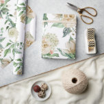 Elegant Cream Floral Botanical Wedding Wrapping Paper<br><div class="desc">This pretty wrapping paper is perfect for your wedding gift or any other special occasion. This design features elegant cream roses with green botanical flourishes against a simple white background. So enchanting for that special someone.</div>