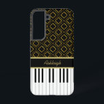 Elegant Custom Piano Keys with Gold Quatrefoil Samsung Galaxy Case<br><div class="desc">An elegant music design featuring piano keys with a golden quatrefoil pattern on a black background. Customisable text is featured on a golden and black accent for your name. Perfect for the pianist, piano student or the piano lover. Please note that there is no real gold or gold foil in...</div>