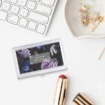 Elegant Dark Violet Floral | Personalised Business Card Holder<br><div class="desc">Personalise this chic business card holder with your name or business name for an elegant way to store your cards. Design features pale lavender purple roses and deep indigo blue peonies on a dark and dramatic background. Add your custom text in modern white lettering. Makes a beautiful gift for graduations...</div>