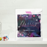 Elegant Deep Blue Pink Winter Wonderland Christmas Favour Bags<br><div class="desc">This year, give your loved ones a gift wrapped in love and memories with our customisable Christmas favour bag! Set against a mesmerising backdrop of deep blue and purple hues, the bag is adorned with whimsical snowflakes and stars, creating a festive atmosphere. The words "Merry Christmas" are elegantly scripted in...</div>