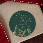 Elegant Deer Christmas Family Name Classic Round Sticker<br><div class="desc">Rustic green trees and deer "Merry and bright" personalised stickers.</div>