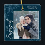 Elegant Engaged Christmas Snowflakes Blue Ceramic Ornament<br><div class="desc">This dark blue square Christmas ornament is a perfect gift for the newly engage couple. The design features a photo frame with handwritten text "Engaged" and is accented with light blue snowflakes on a dark blue background. Personalize with a pictures of the couple,  their names and year.</div>